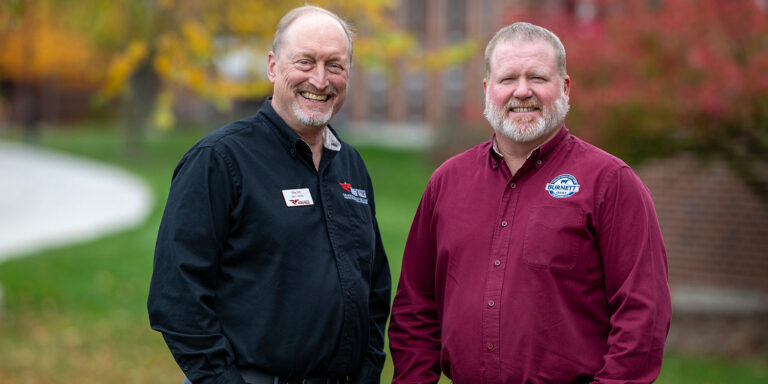 Photo: Michael Orth, dean of the UW-River Falls College of Agriculture, Food and Environmental Science, and Matt Winsand, CEO of Burnett Dairy Cooperative, are pictured on the UWRF campus in October. The two organizations began a new strategic partnership on Nov. 1 that aims to advance dairy innovation and education.